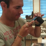 Patrik photographing through a microscope
