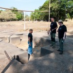 Marcío, Patrik and Liv examine a prior excavation.